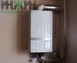 Монтаж настенного котла Vaillant в котельной частного дома