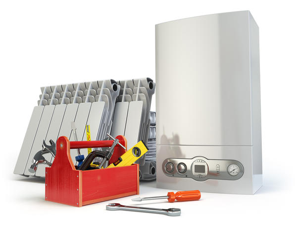 Компоненты системы отопления: газовый котел и радиаторы